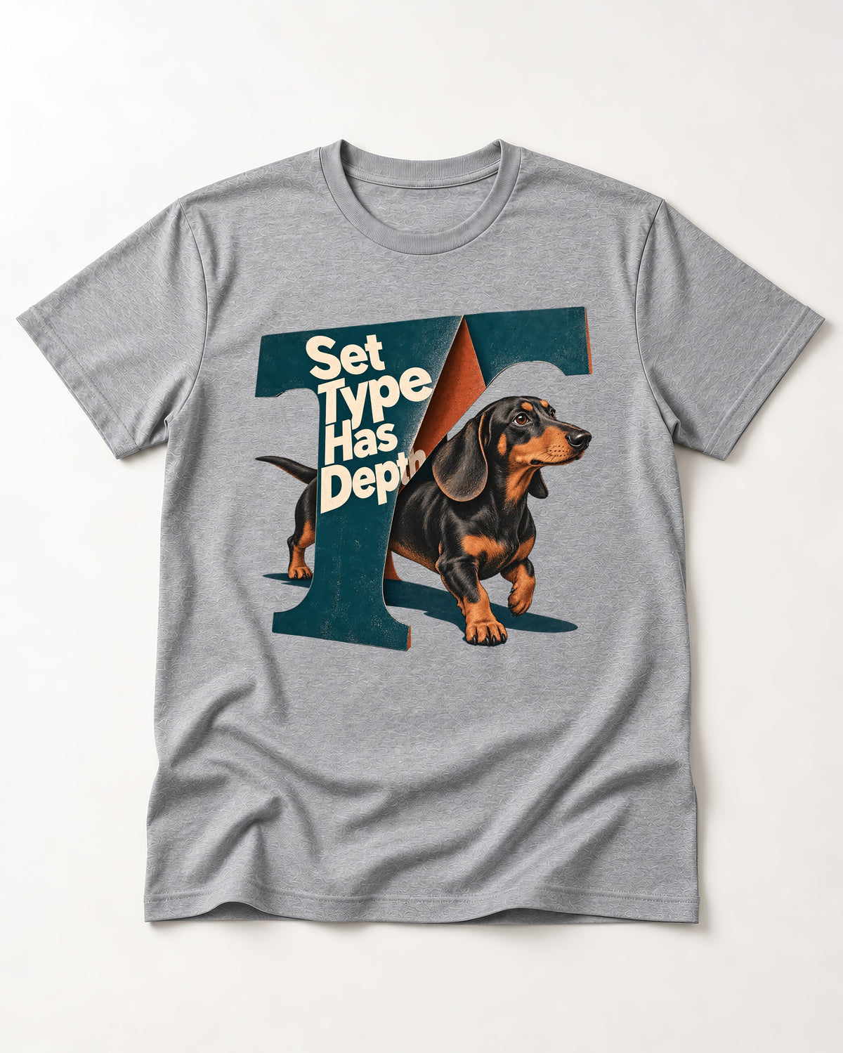 Dachshund Set Type Has Depth Folded Letter Graphic T-Shirt in Sport Grey, flat lay product photo