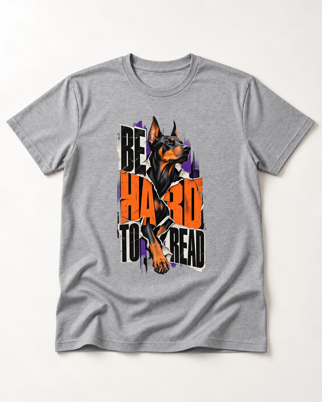 Doberman Be Hard to Read Torn Poster Graphic T-Shirt in Sport Grey, flat lay product photo