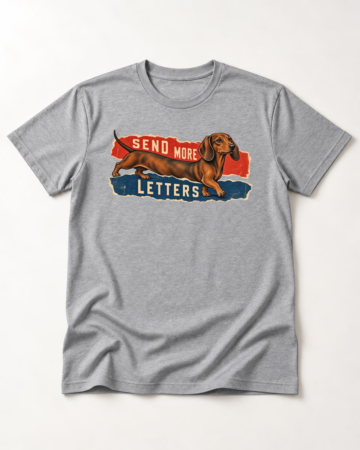 Dachshund Send More Letters Torn Paper Graphic T-Shirt in Sport Grey, flat lay product photo