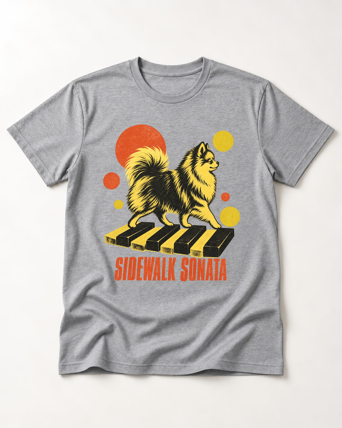 Pomeranian Sidewalk Sonata Piano Graphic T-Shirt in Sport Grey, flat lay product photo