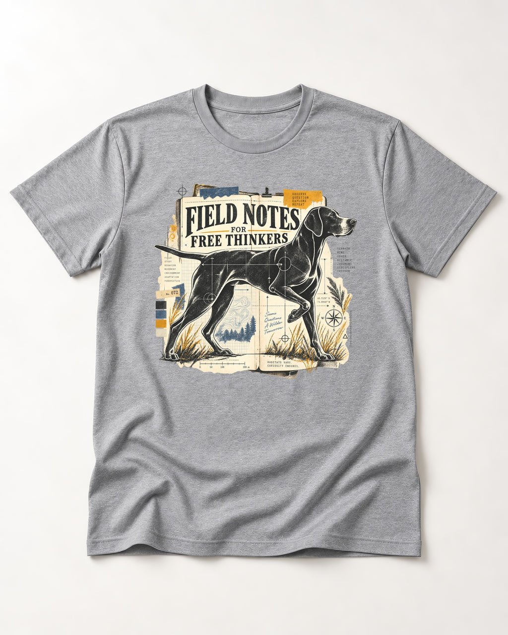 Field Notes for Free Thinkers Collage German Shorthaired Pointer Graphic T-Shirt in Sport Grey, flat lay product photo