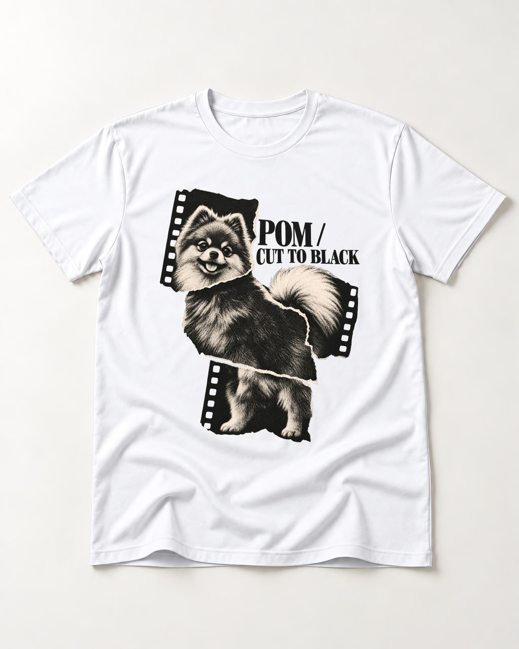 Pomeranian Cut to Black T-Shirt in White, flat lay product photo
