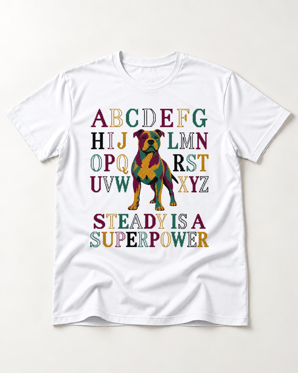 Pitbull Steady Is a Superpower Alphabet Graphic T-Shirt in White, flat lay product photo