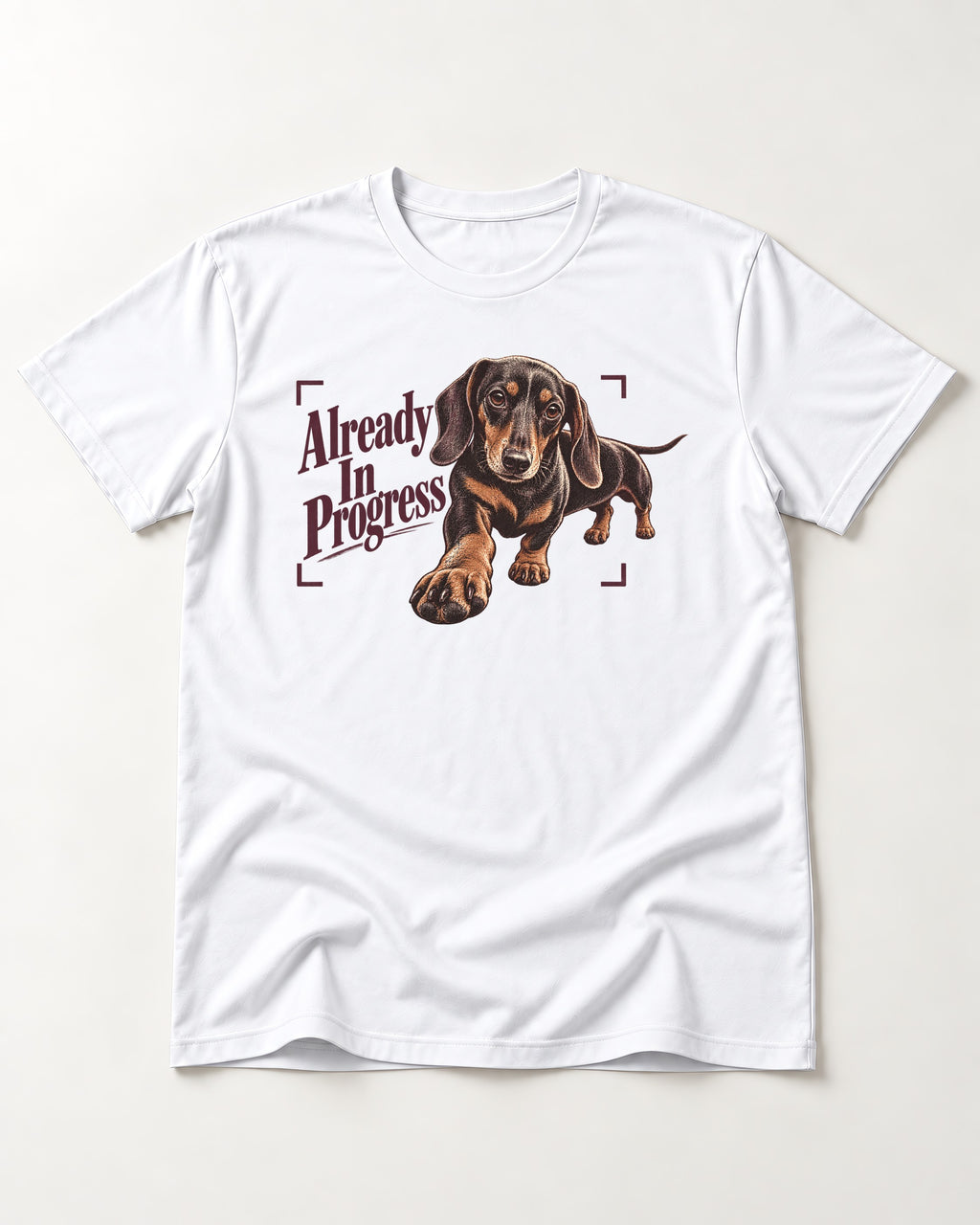 Dachshund Already in Progress T-Shirt in White, flat lay product photo