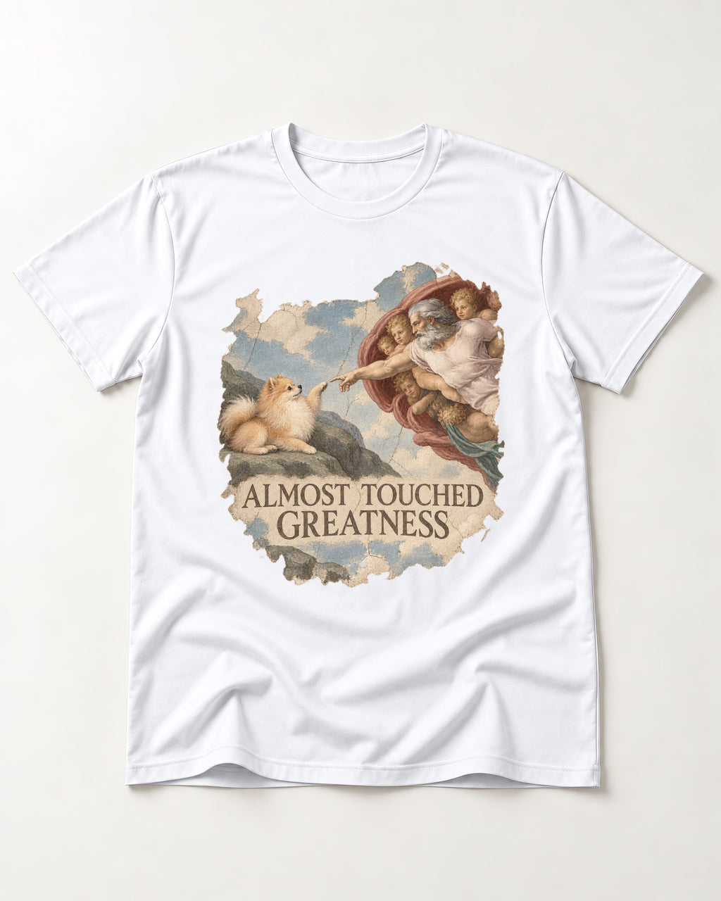 Pomeranian Almost Touched Greatness Fresco Graphic T-Shirt in White, flat lay product photo