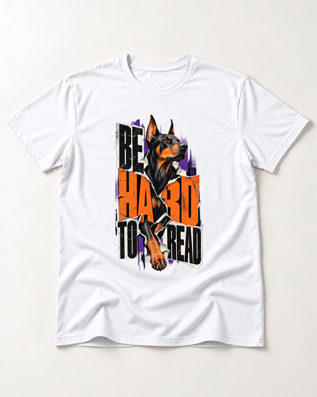 Doberman Be Hard to Read Torn Poster Graphic T-Shirt in White, flat lay product photo