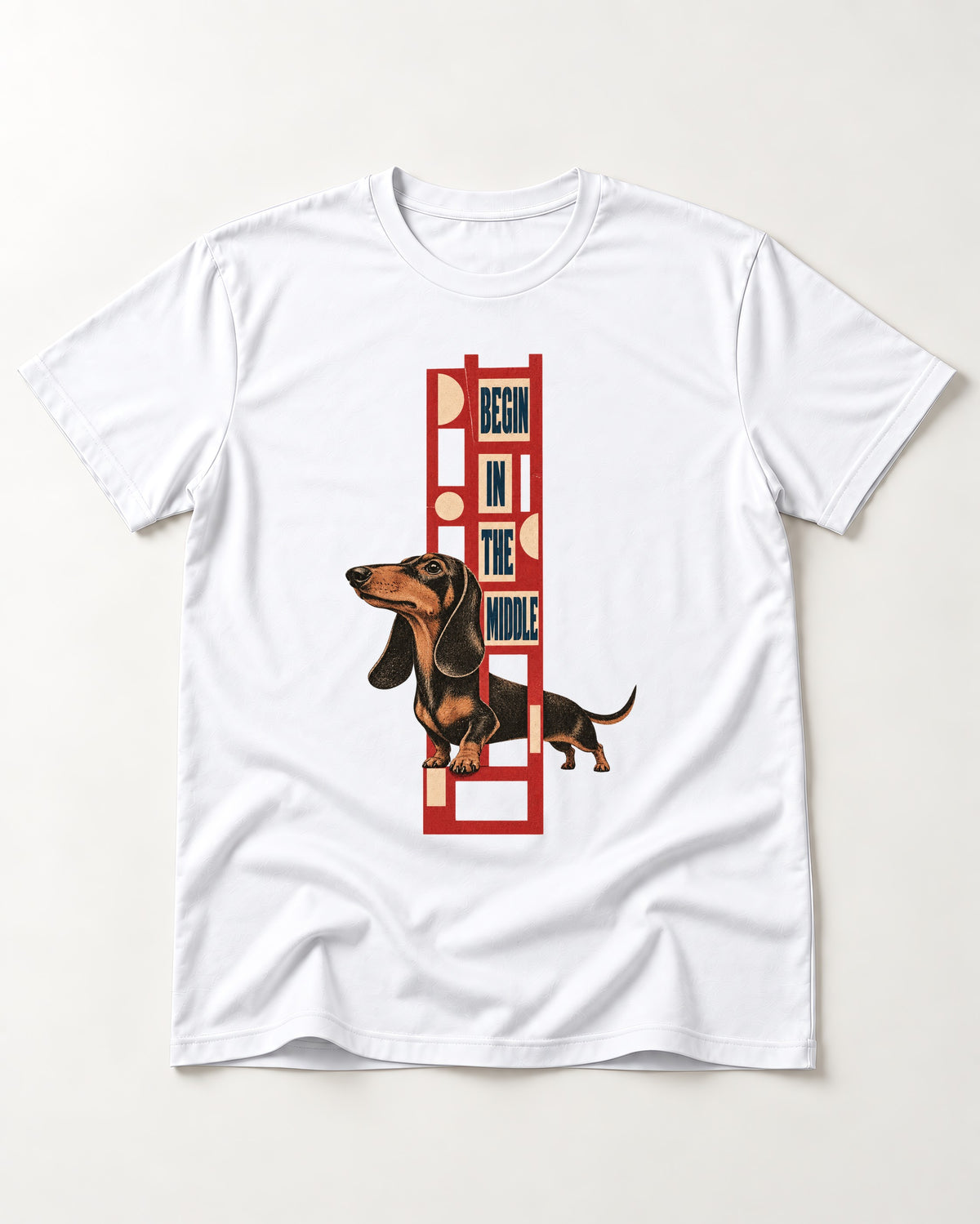 Dachshund Begins in the Middle T-Shirt in White, flat lay product photo