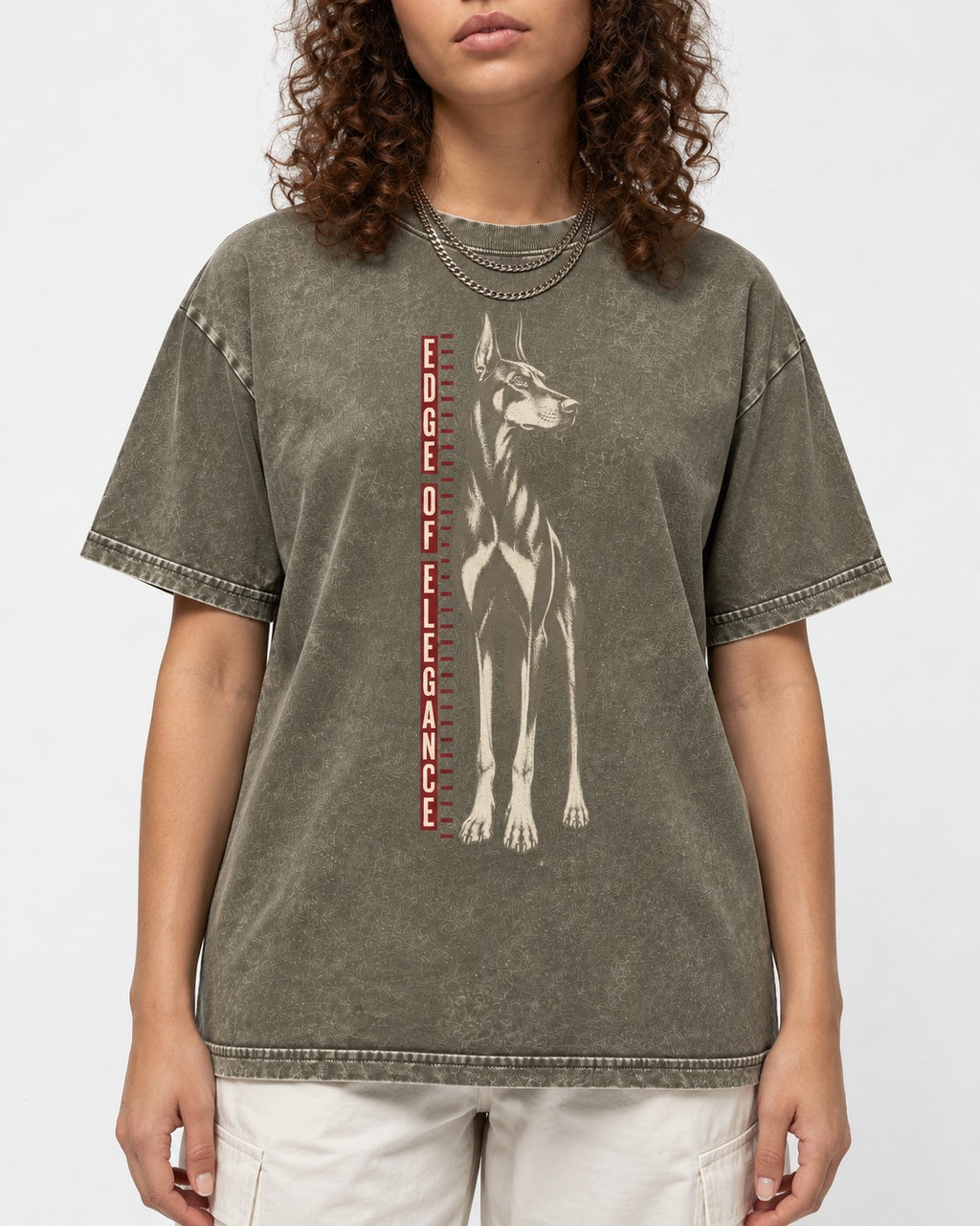 Doberman Edge of Elegance Height Chart Graphic Washed Tee in Army Green, worn by a model, front view