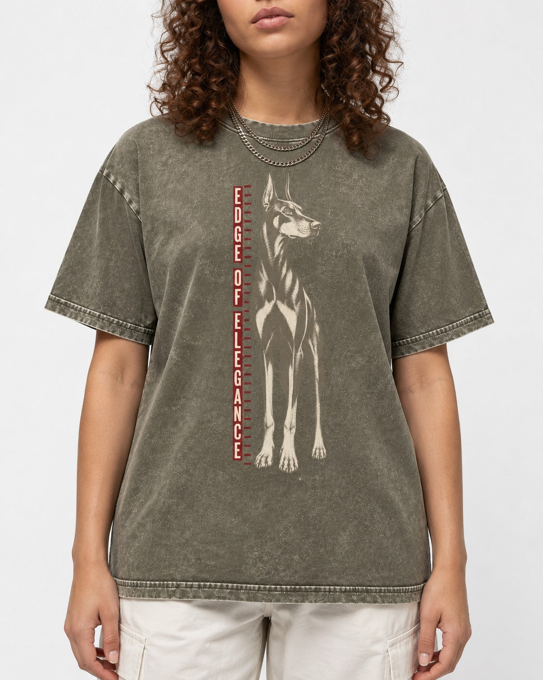 Doberman Edge of Elegance Height Chart Graphic Washed Tee in Army Green, worn by a model, front view