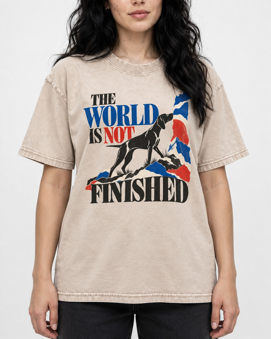 World Is Not Finished German Shorthaired Pointer Washed Tee in Apricot, worn by a model, front view