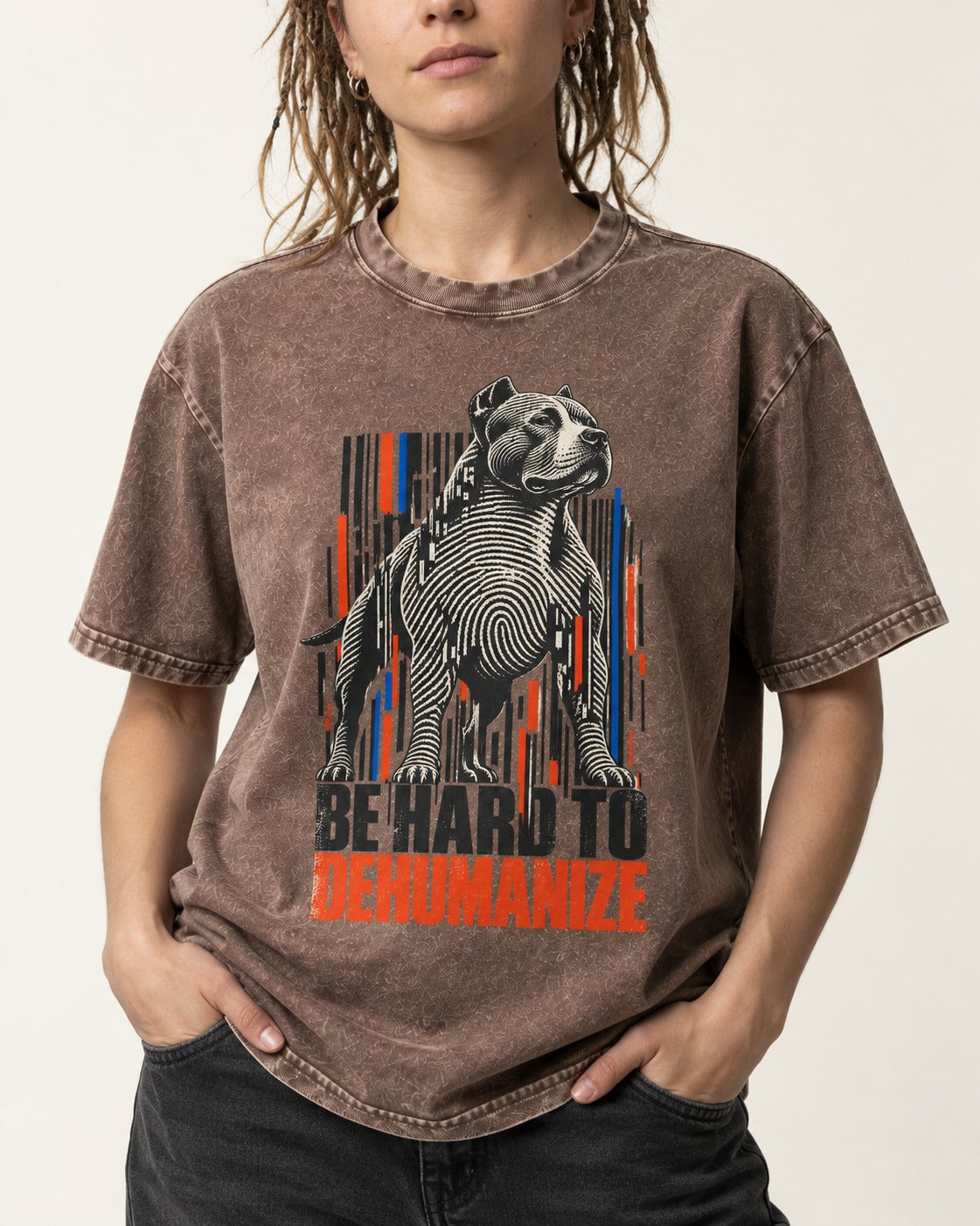 Pitbull Hard to Dehumanize Washed Tee in Coffee, worn by a model, front view