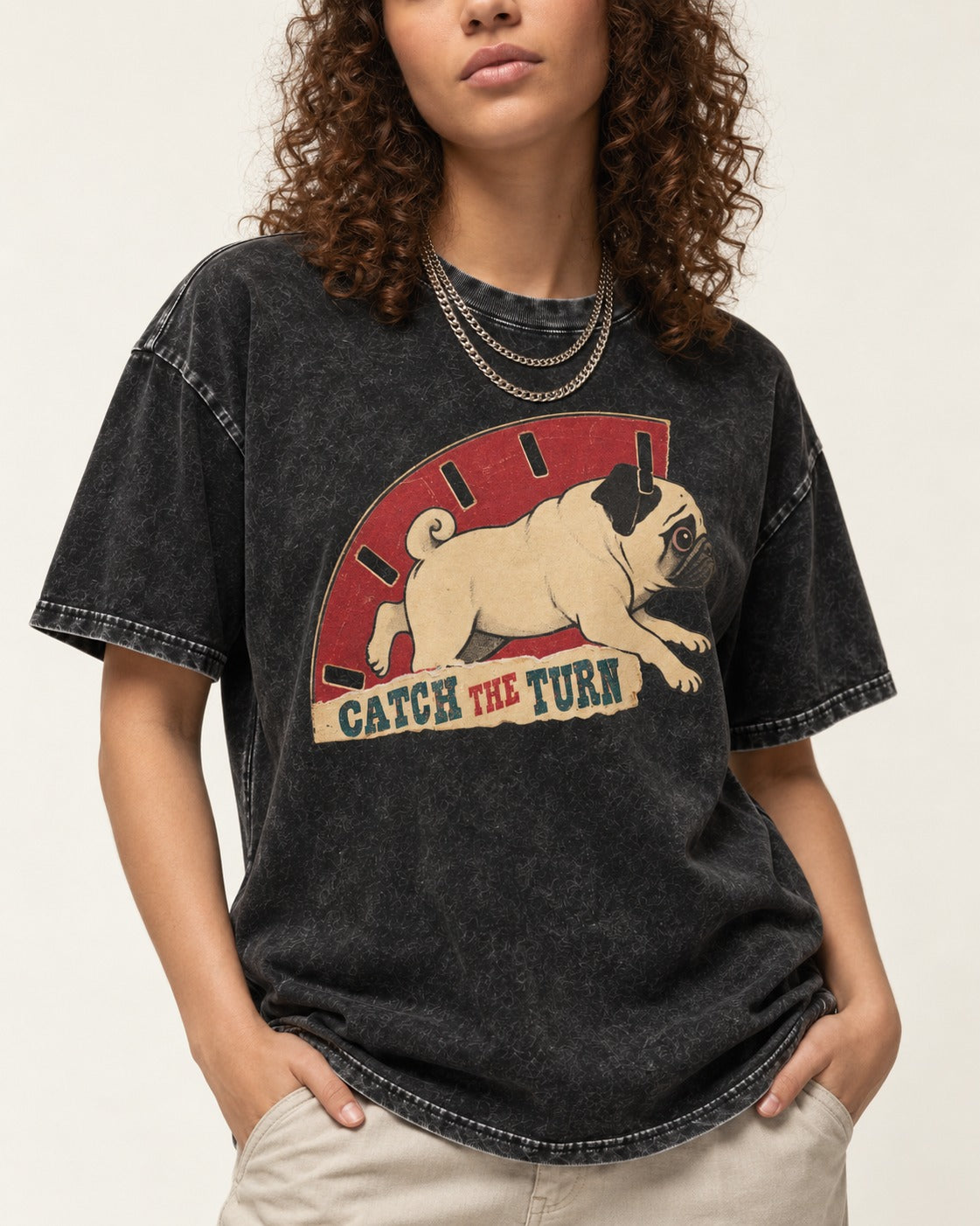 Pug Catch the Turn Track Graphic Washed Tee in Black, worn by a model, front view