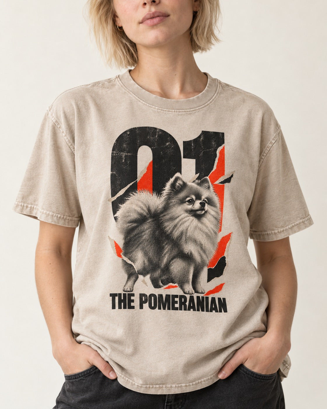 The Pomeranian Washed Tee in Apricot, worn by a model, front view