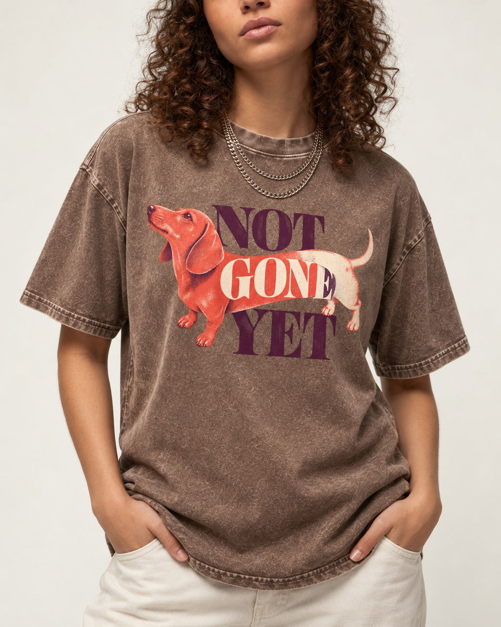 Dachshund Not Gone Yet Washed Tee in Coffee, worn by a model, front view