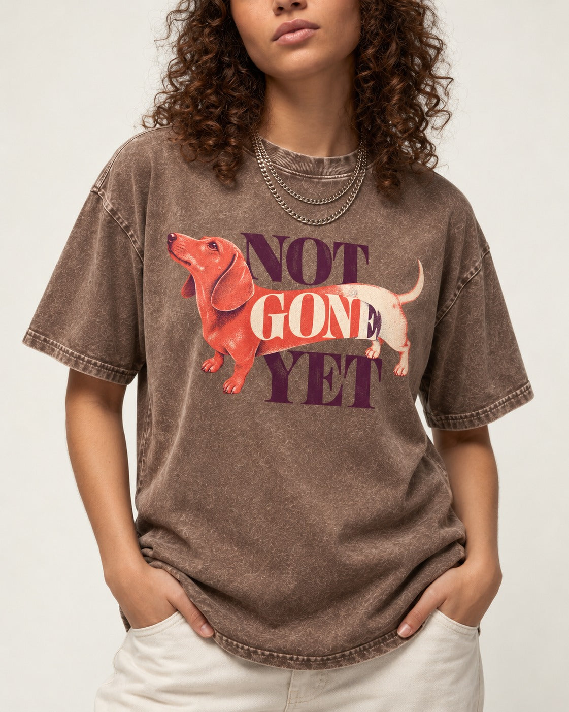Dachshund Not Gone Yet Washed Tee in Coffee, worn by a model, front view