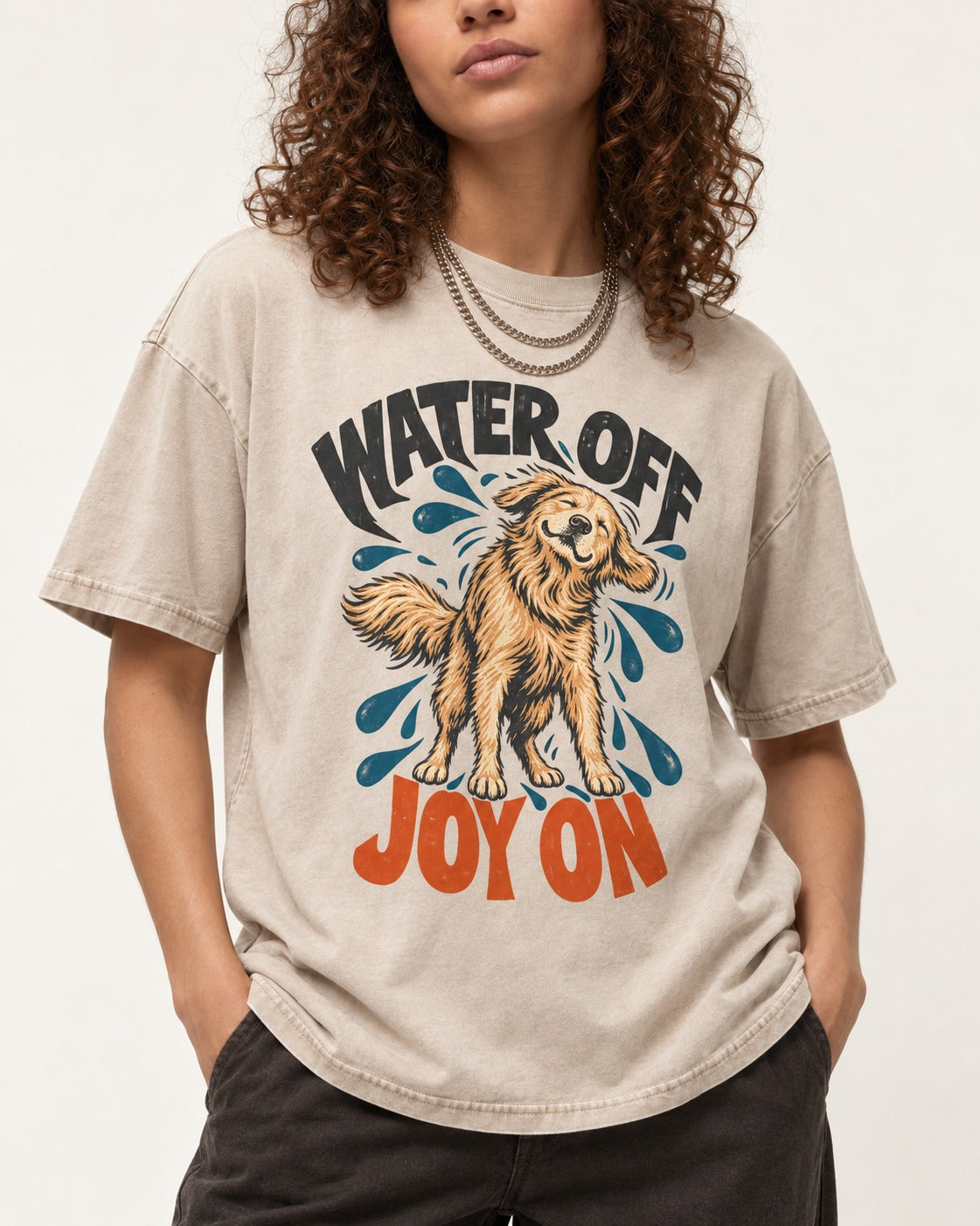 Water Off Joy on Golden Retriever Washed Tee in Apricot, worn by a model, front view