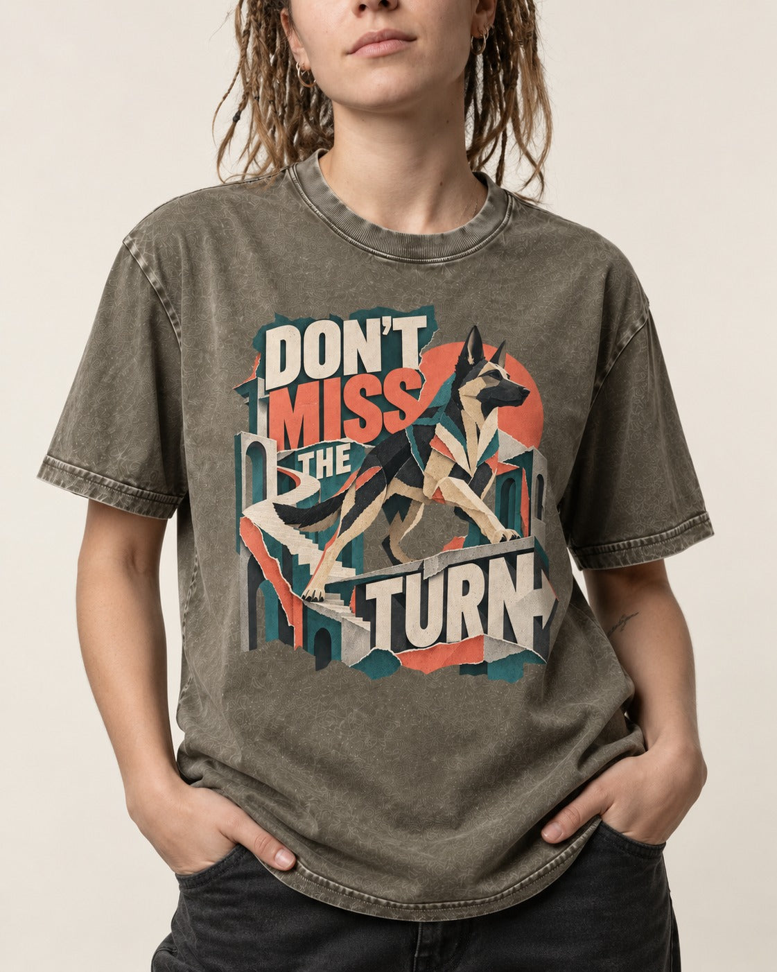 Dont Miss The Turn Escher Staircase German Shepherd Dog Graphic Washed Tee in Army Green, worn by a model, front view