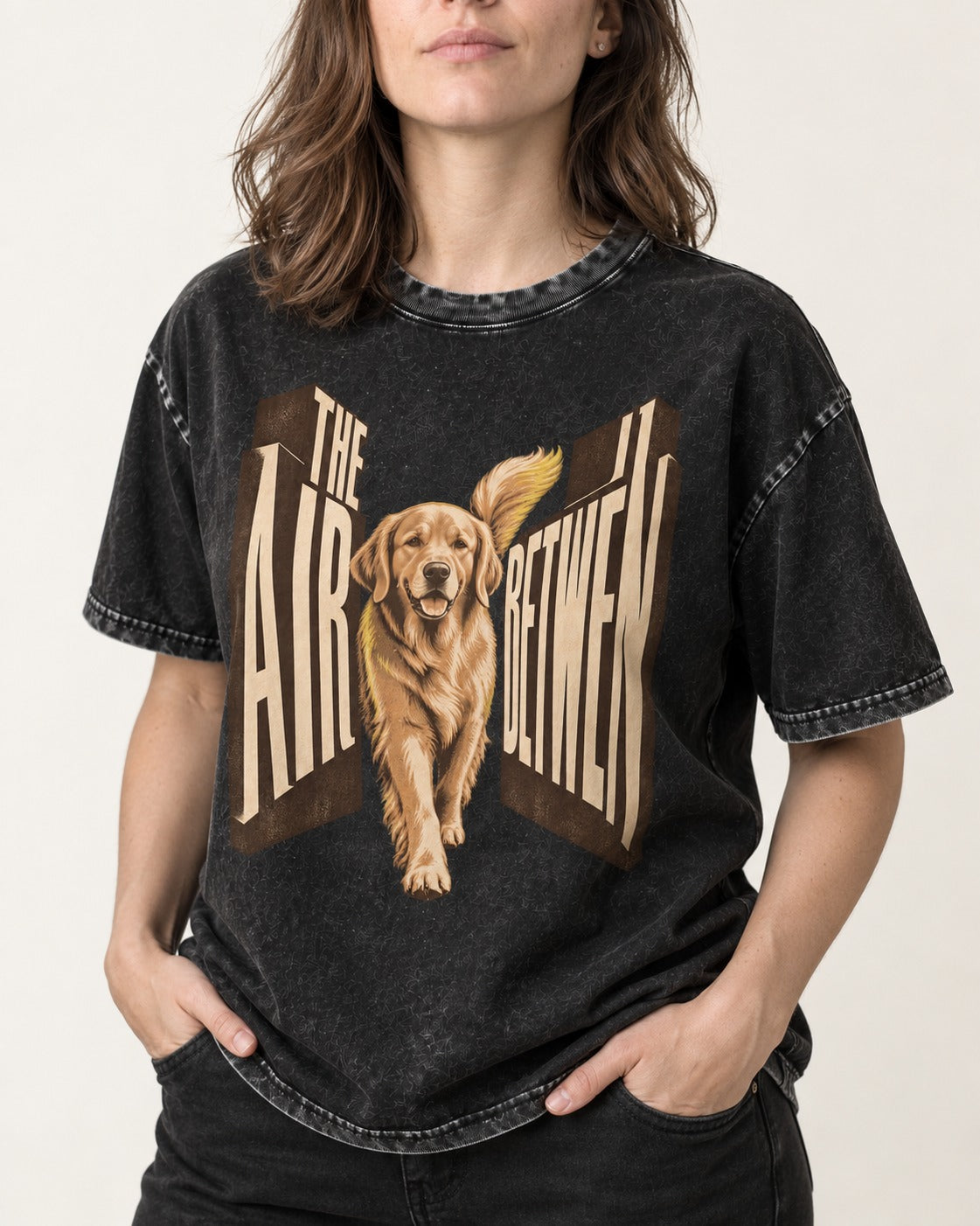 The Air Between Dimensional Golden Retriever Graphic Washed Tee in Black, worn by a model, front view