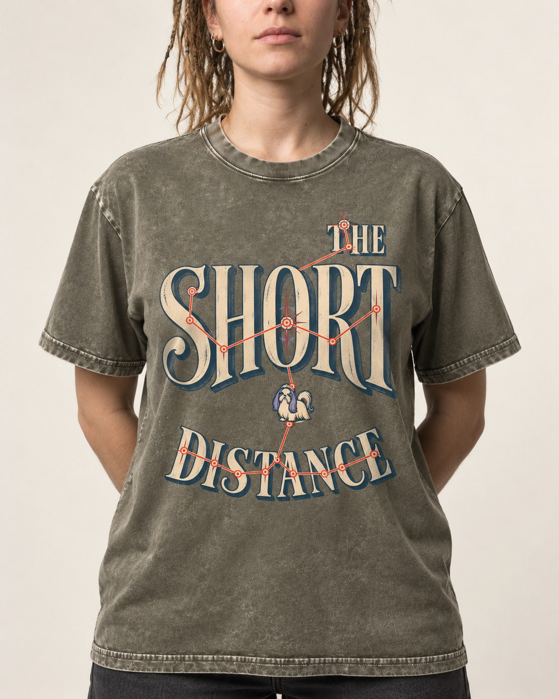Shih Tzu The Short Distance Route Graphic Washed Tee in Army Green, worn by a model, front view