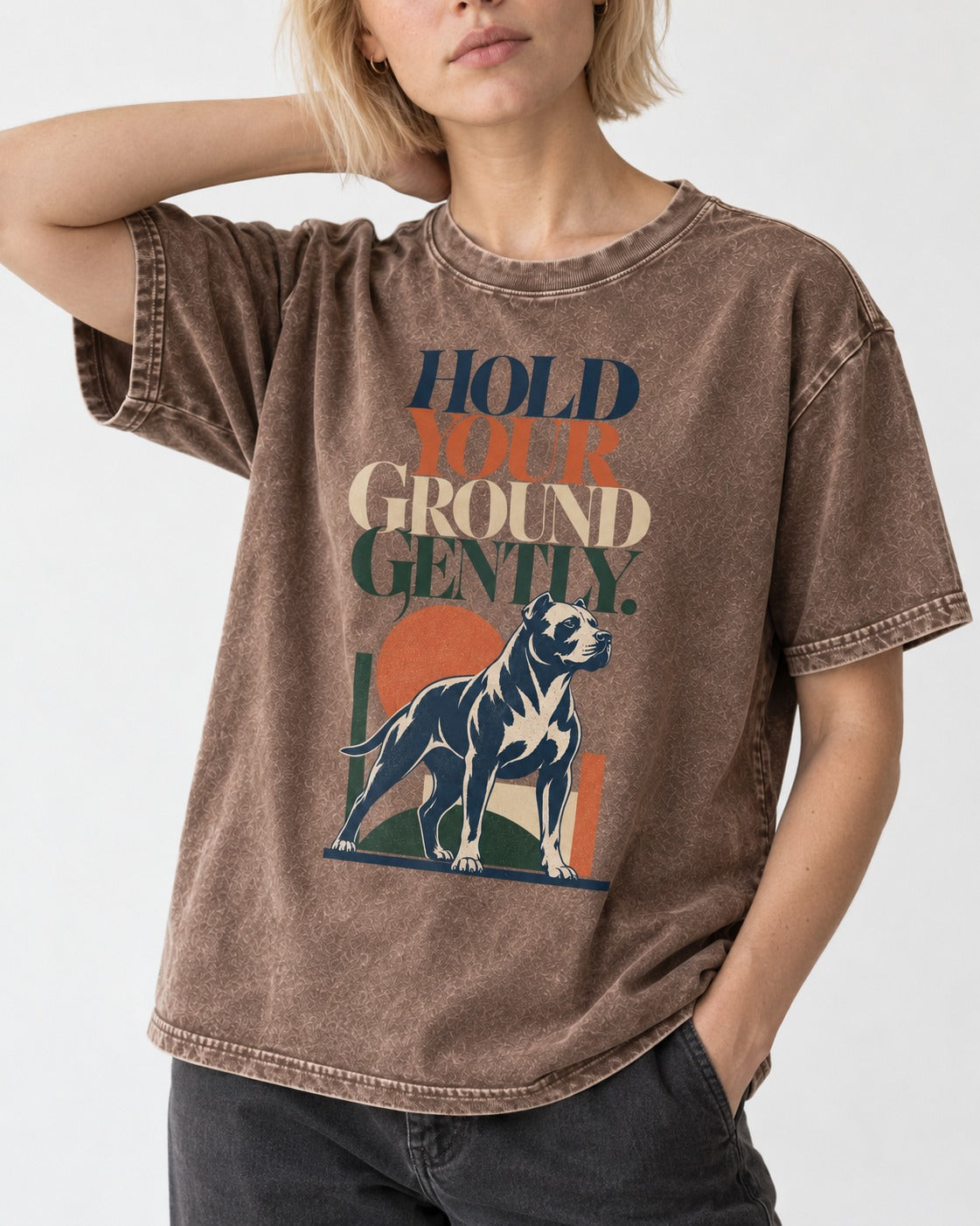 Pitbull Hold Your Ground Gently Standing Dog Graphic Washed Tee in Coffee, worn by a model, front view