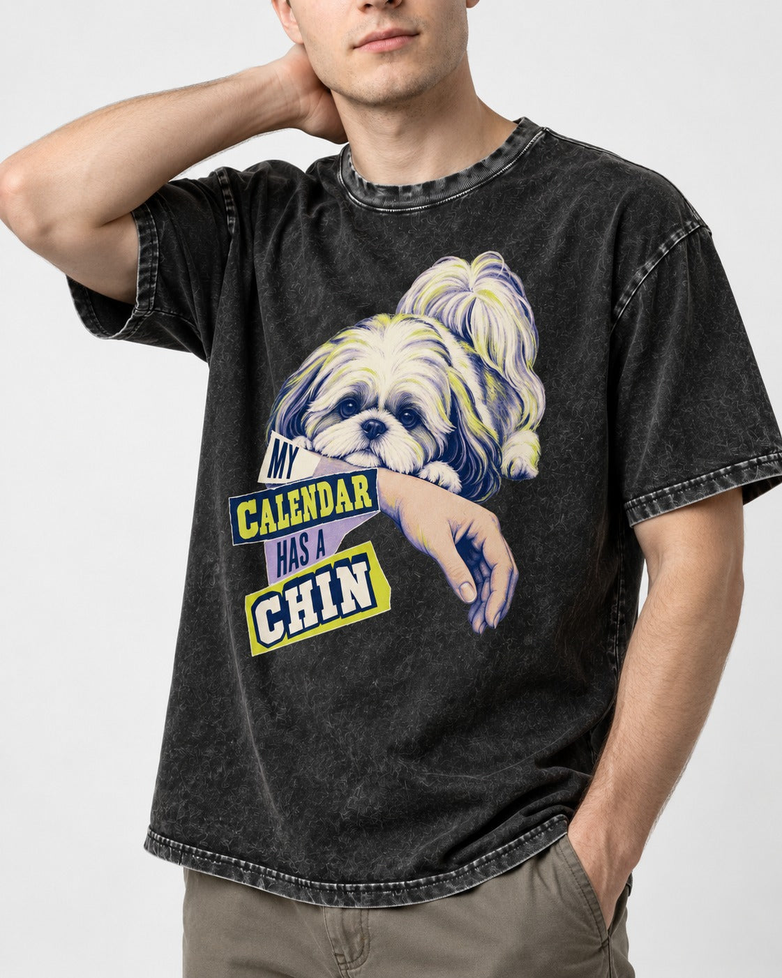 Shih Tzu My Calendar Has a Chin Arm Rest Graphic Washed Tee in Black, worn by a model, front view