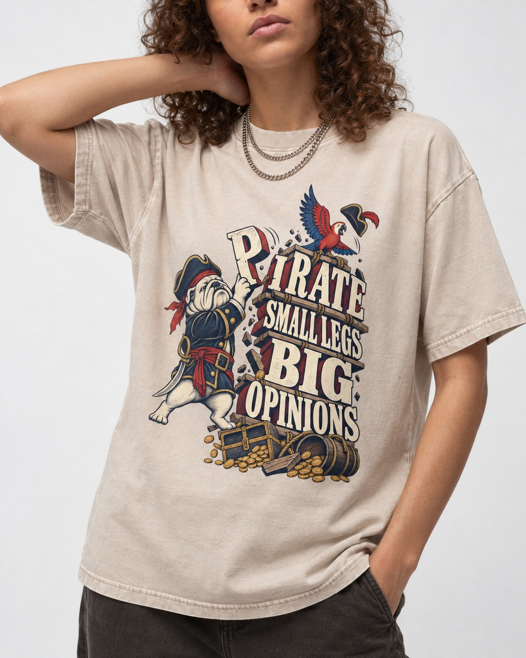 Pirate English Bulldog Big Opinions Washed Tee in Apricot, worn by a model, front view