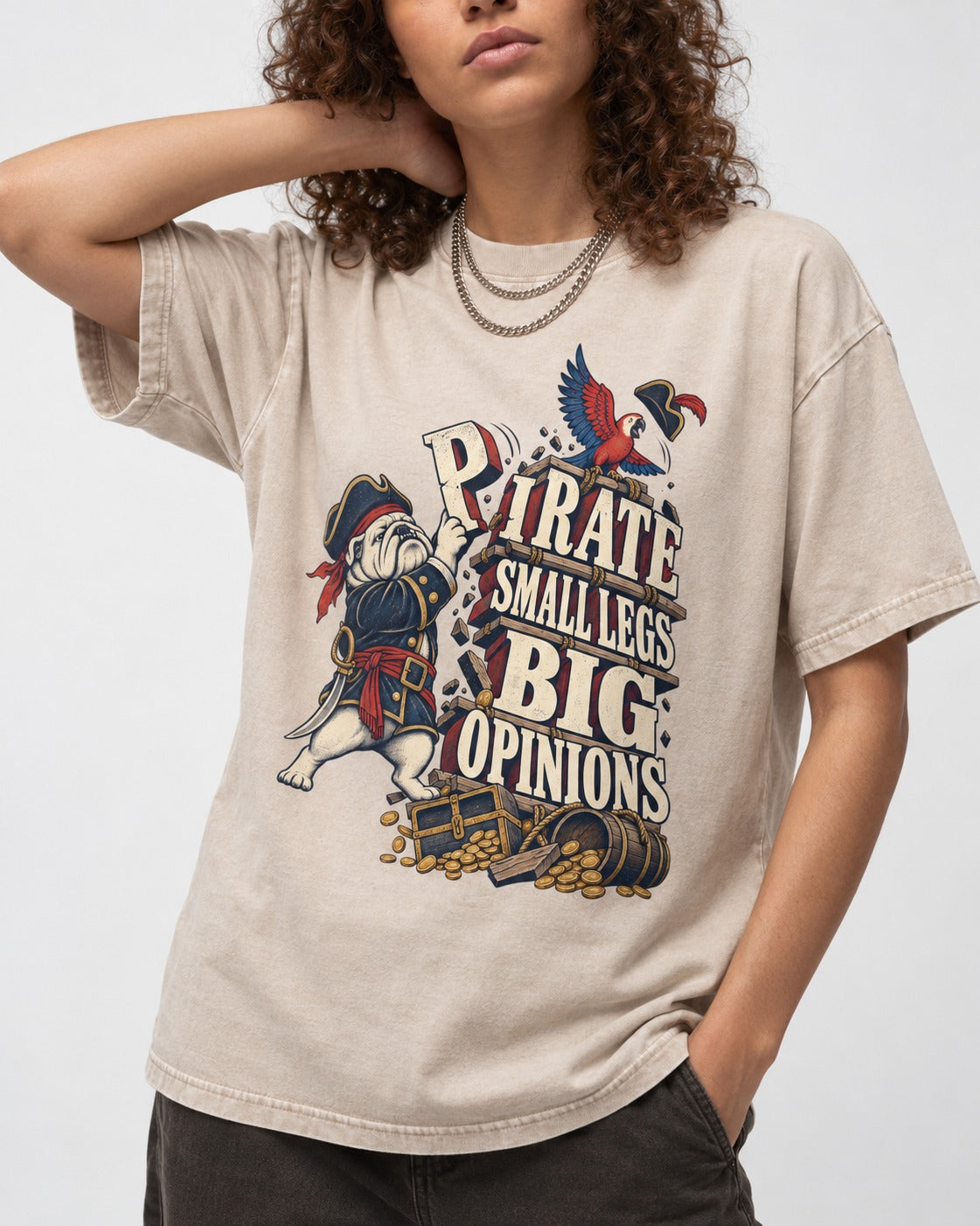 Pirate English Bulldog Big Opinions Washed Tee in Apricot, worn by a model, front view