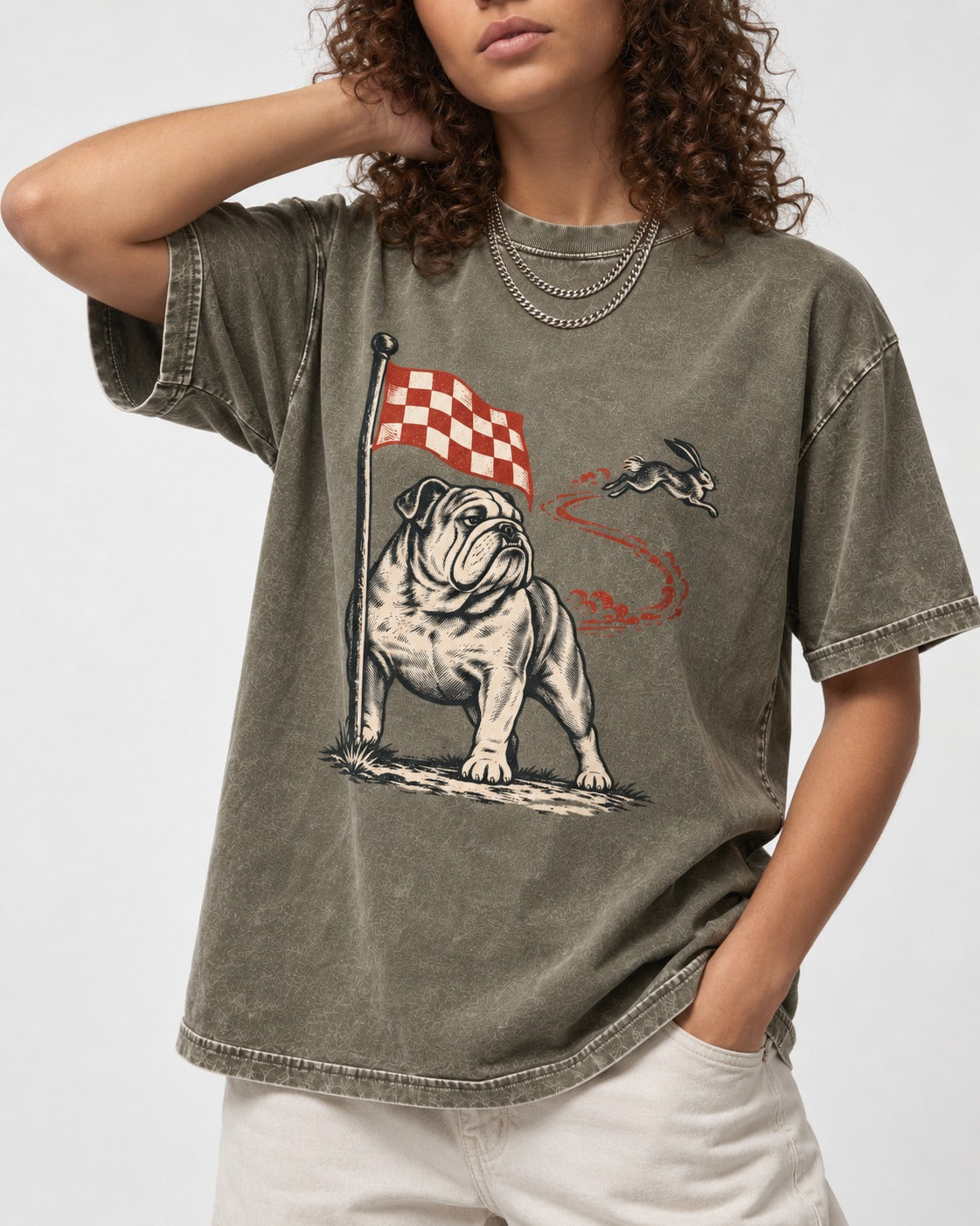 English Bulldog Checkered Flag Rabbit Chase Washed Tee in Army Green, worn by a model, front view