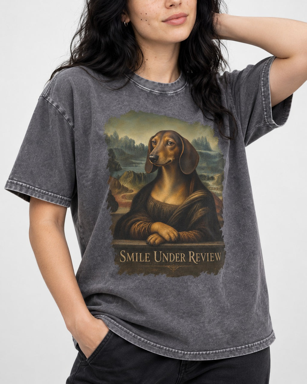 Dachshund Smile Under Review Mona Lisa Graphic Washed Tee in Gray, worn by a model, front view