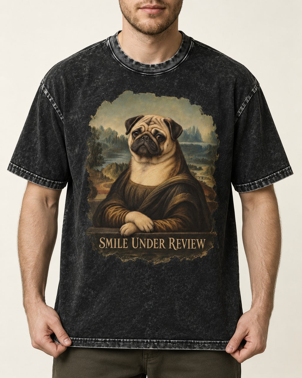 Pug Smile Under Review Mona Lisa Graphic Washed Tee in Black, worn by a model, front view