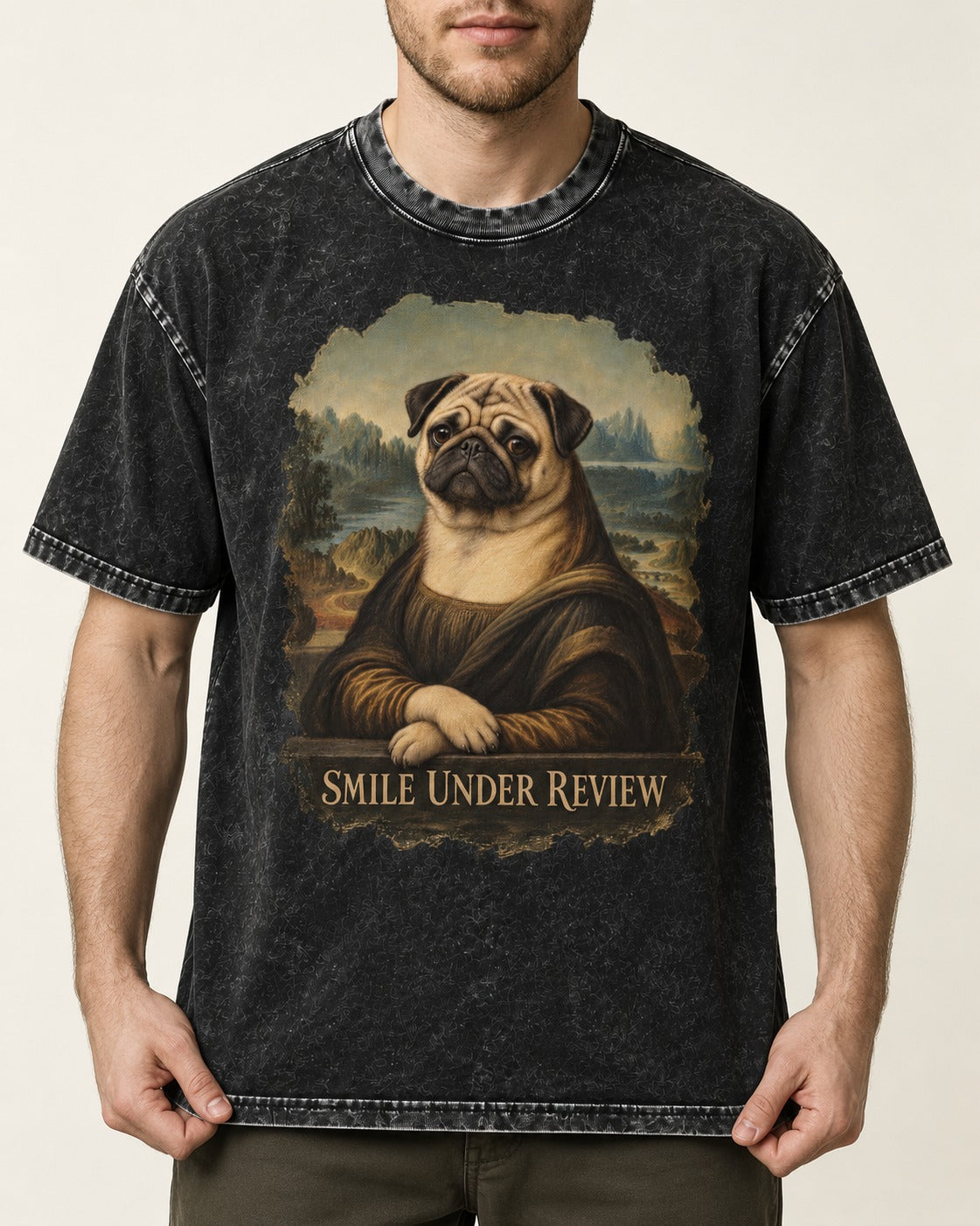 Pug Smile Under Review Mona Lisa Graphic Washed Tee in Black, worn by a model, front view