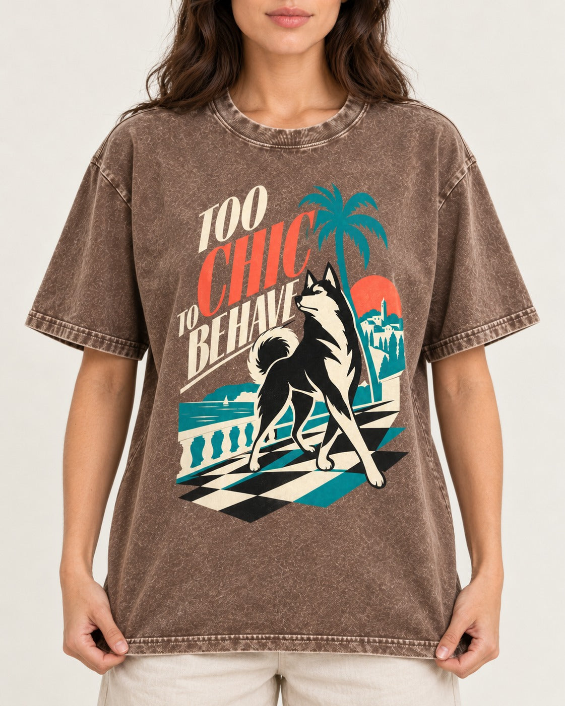 Husky Too Chic to Behave Riviera Graphic Washed Tee in Coffee, worn by a model, front view