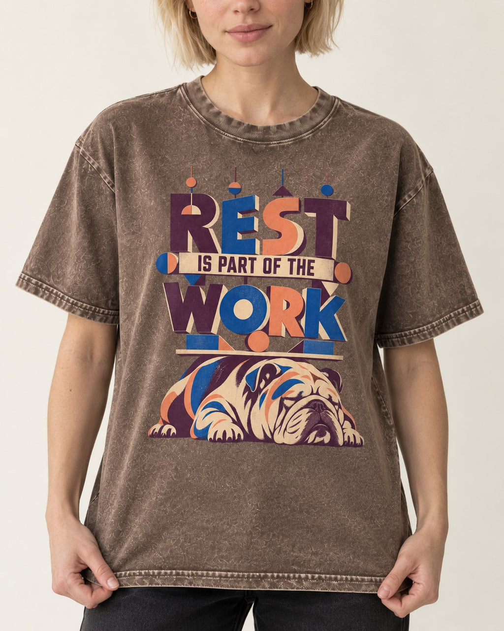 Rest Is Work English Bulldog Washed Tee in Coffee, worn by a model, front view