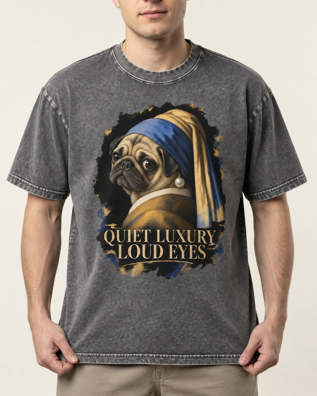 Pug Quiet Luxury Loud Eyes Pearl Portrait Graphic Washed Tee in Gray, worn by a model, front view