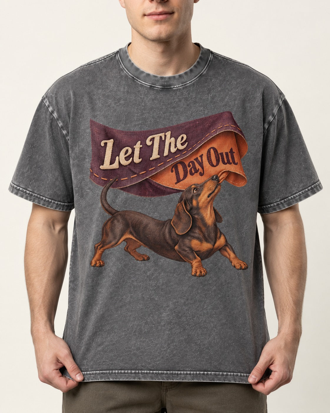 Dachshund Let The Day Out Fabric Banner Graphic Washed Tee in Gray, worn by a model, front view