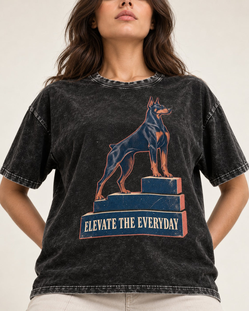 Doberman Elevate the Everyday Podium Graphic Washed Tee in Black, worn by a model, front view