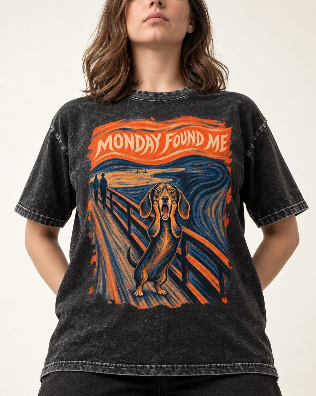 Dachshund Monday Found Me Scream Poster Washed Tee in Black, worn by a model, front view