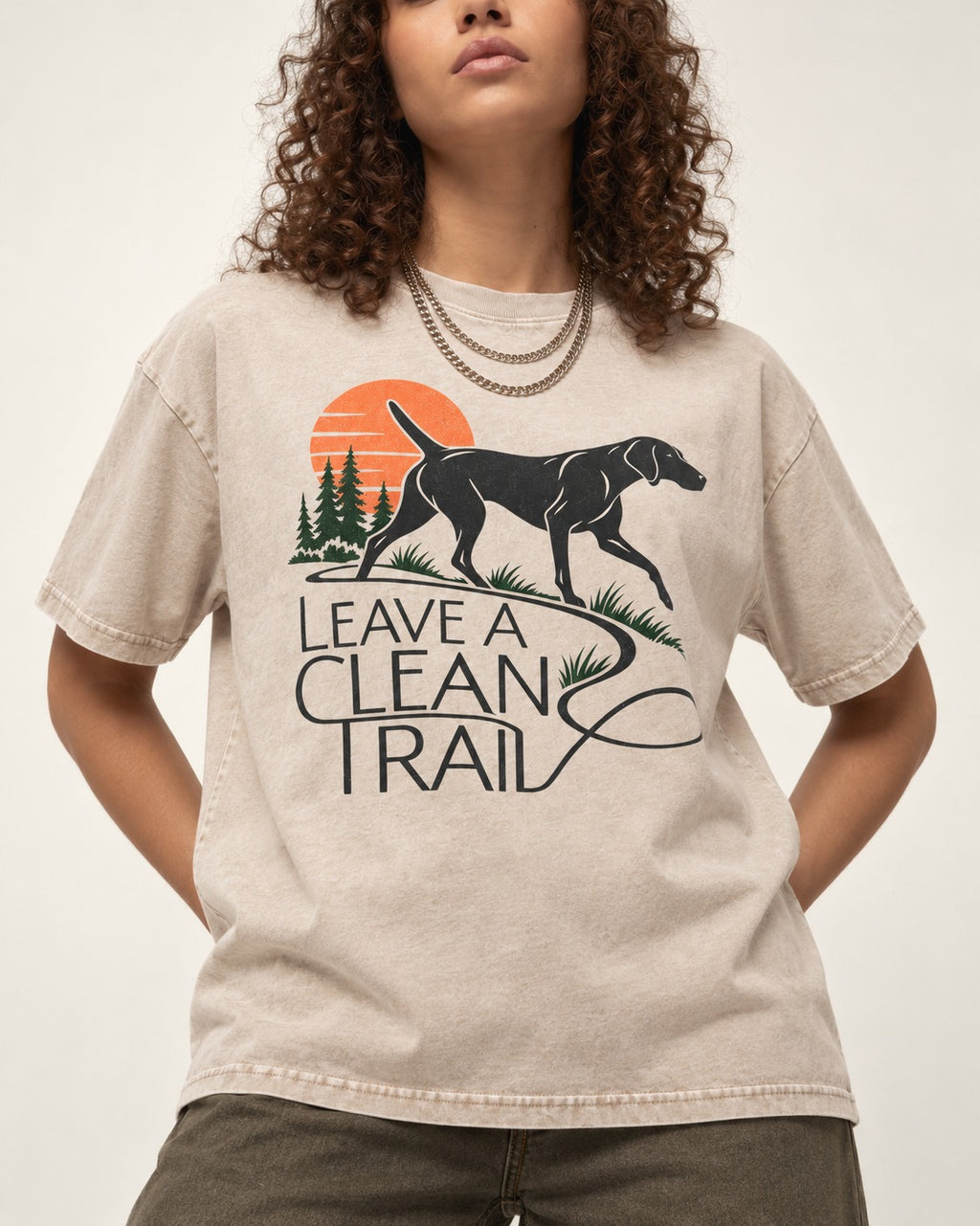 Leave a Clean Trail German Shorthaired Pointer Washed Tee in Apricot, worn by a model, front view