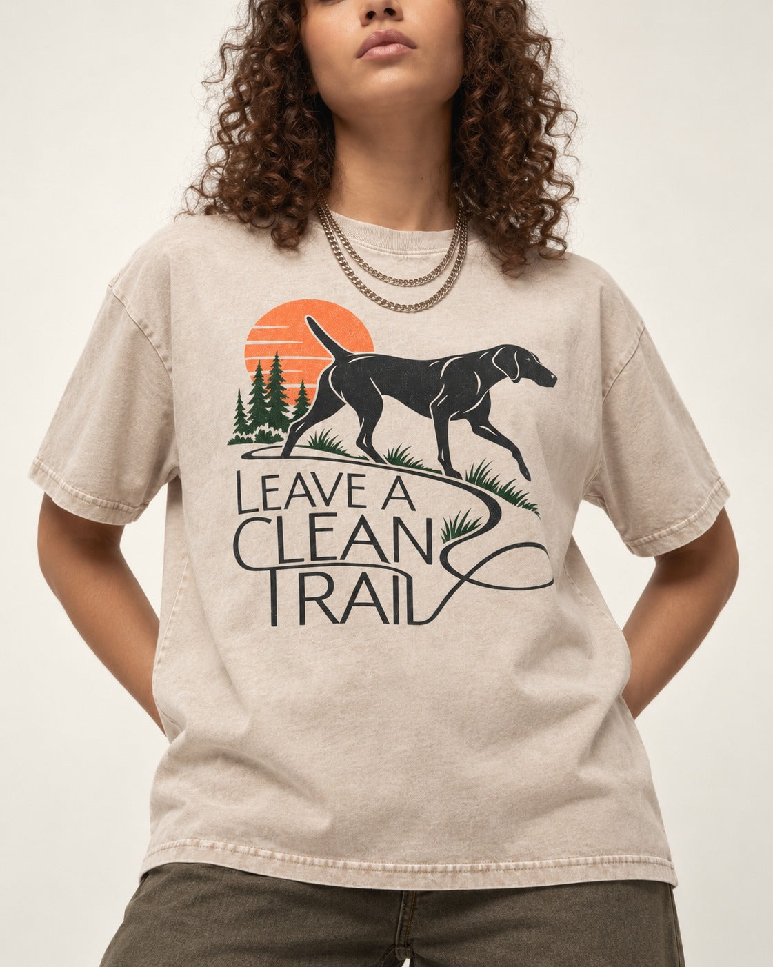 Leave a Clean Trail German Shorthaired Pointer Washed Tee in Apricot, worn by a model, front view
