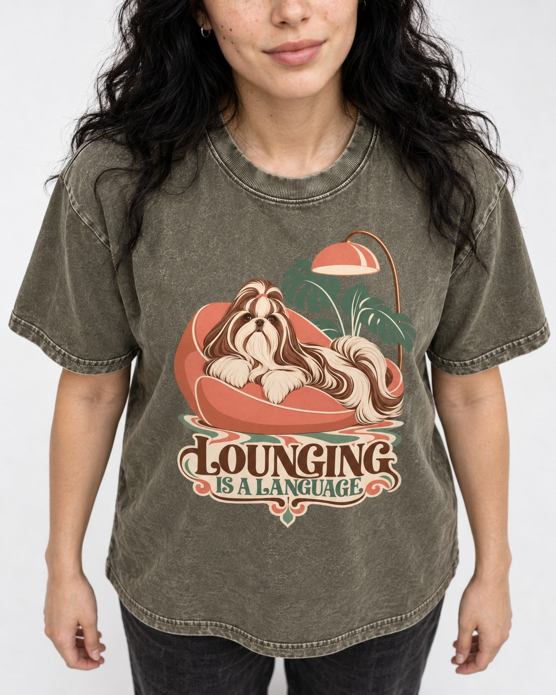 Shih Tzu Lounging Is a Language Retro Lounge Graphic Washed Tee in Army Green, worn by a model, front view