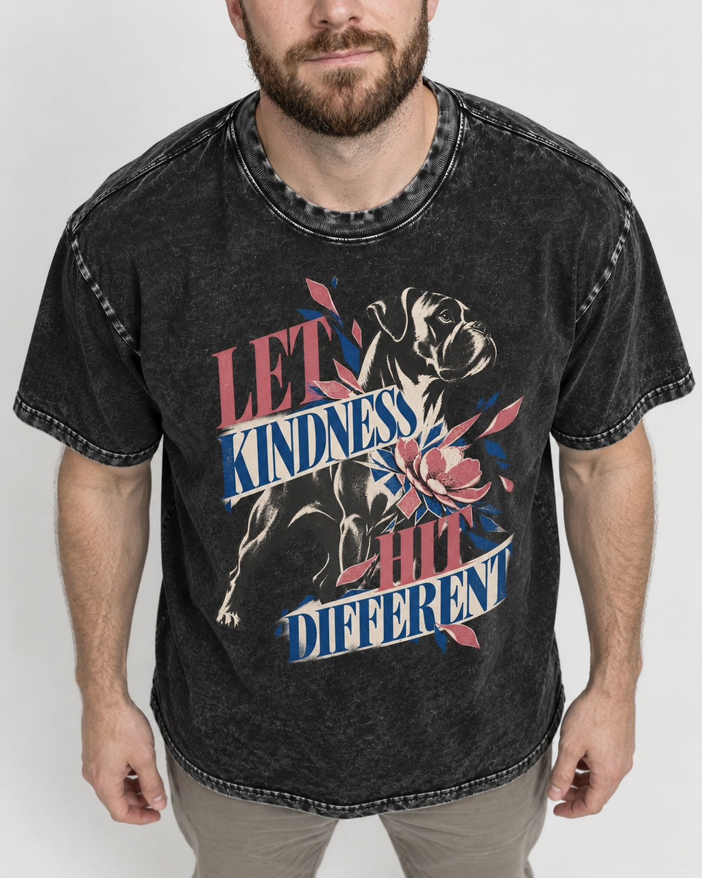 Let Kindness Hit Different Boxer Floral Collage Washed Tee in Black, worn by a model, front view