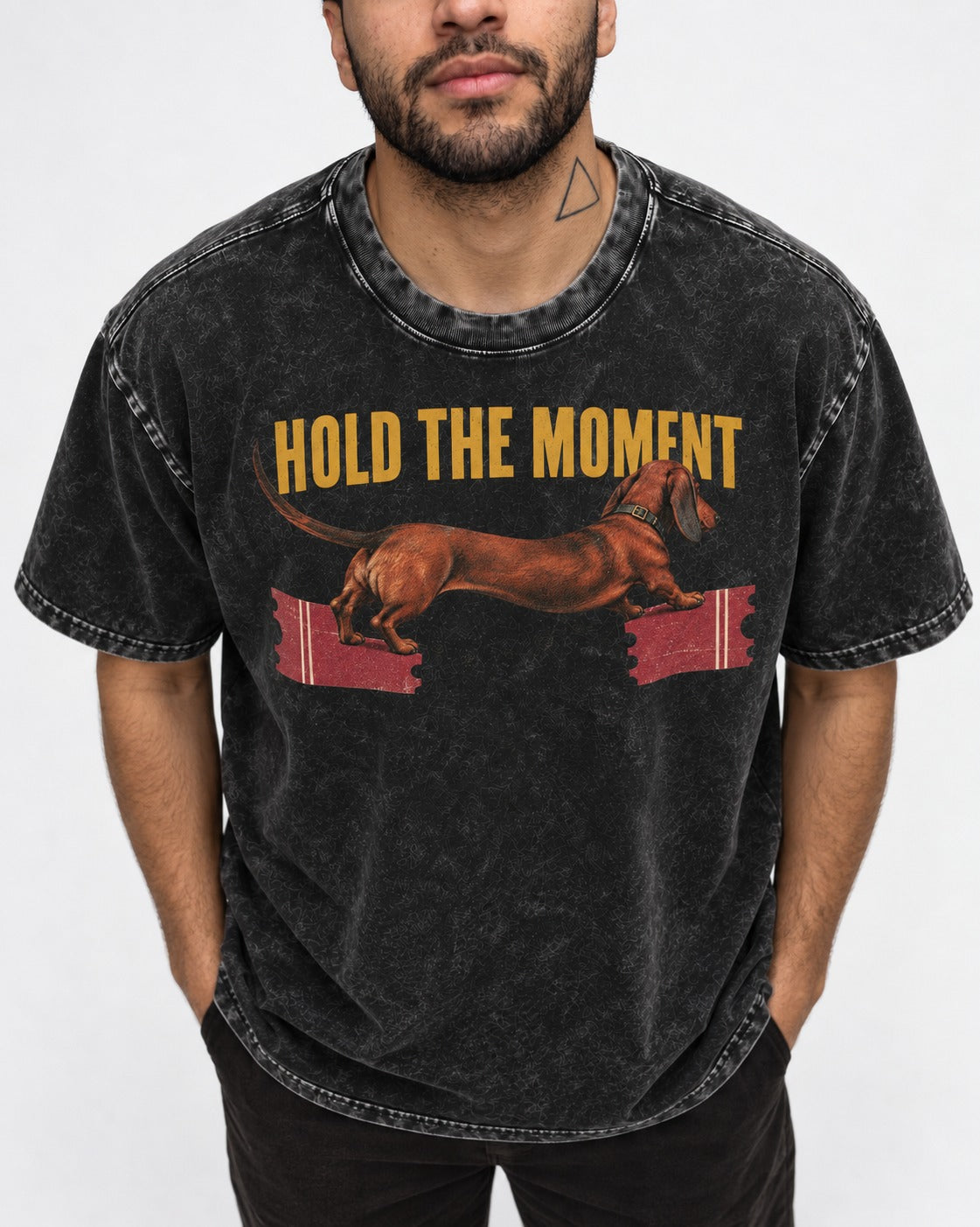 Dachshund Hold The Moment Torn Ticket Bridge Graphic Washed Tee in Black, worn by a model, front view