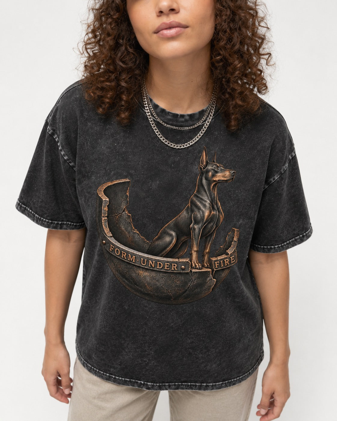Doberman Form Under Fire Broken Shell Graphic Washed Tee in Black, worn by a model, front view