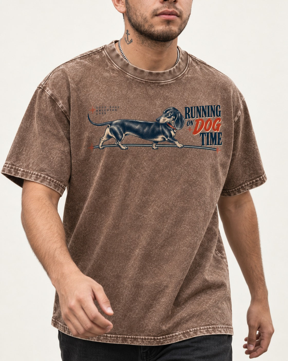 Dachshund Lengthens Life Washed Tee in Coffee, worn by a model, front view