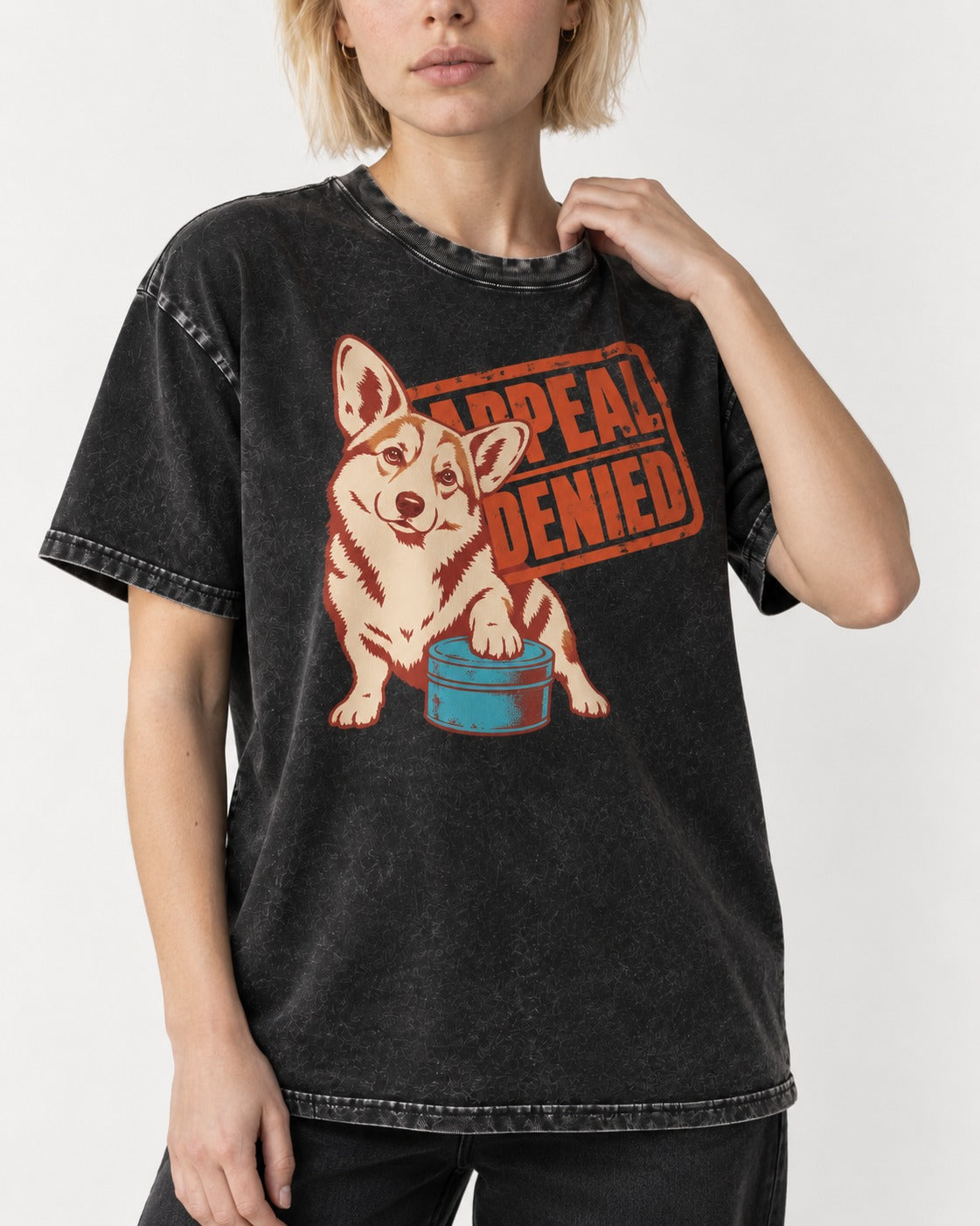 Corgi Appeal Denied Treat Tin Washed Tee in Black, worn by a model, front view