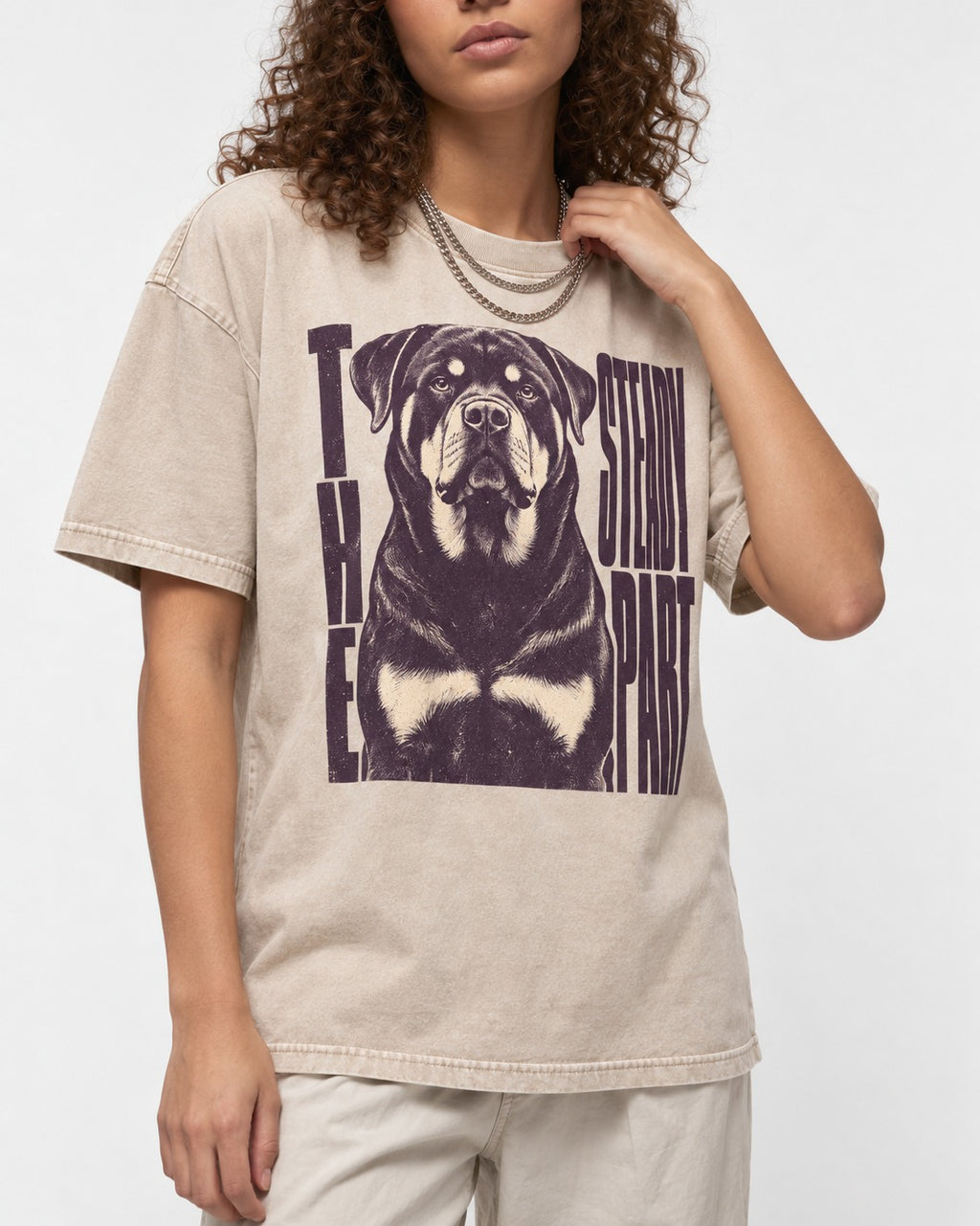 Rottweiler The Steady Part Washed Tee in Apricot, worn by a model, front view
