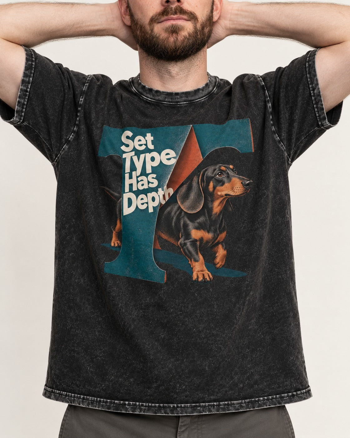 Dachshund Set Type Has Depth Folded Letter Graphic Washed Tee in Black, worn by a model, front view