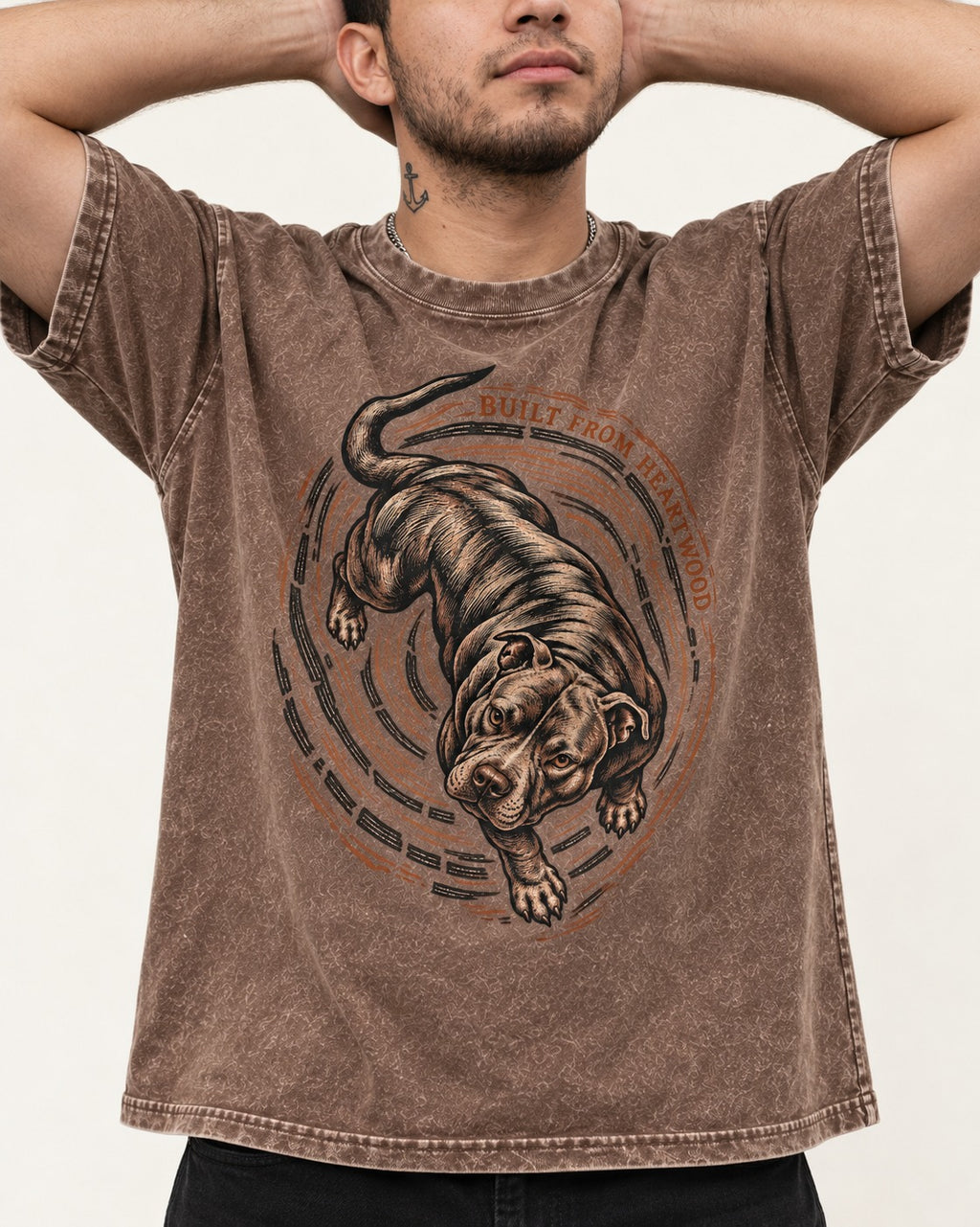 Pitbull Built From Heartwood Washed Tee in Coffee, worn by a model, front view
