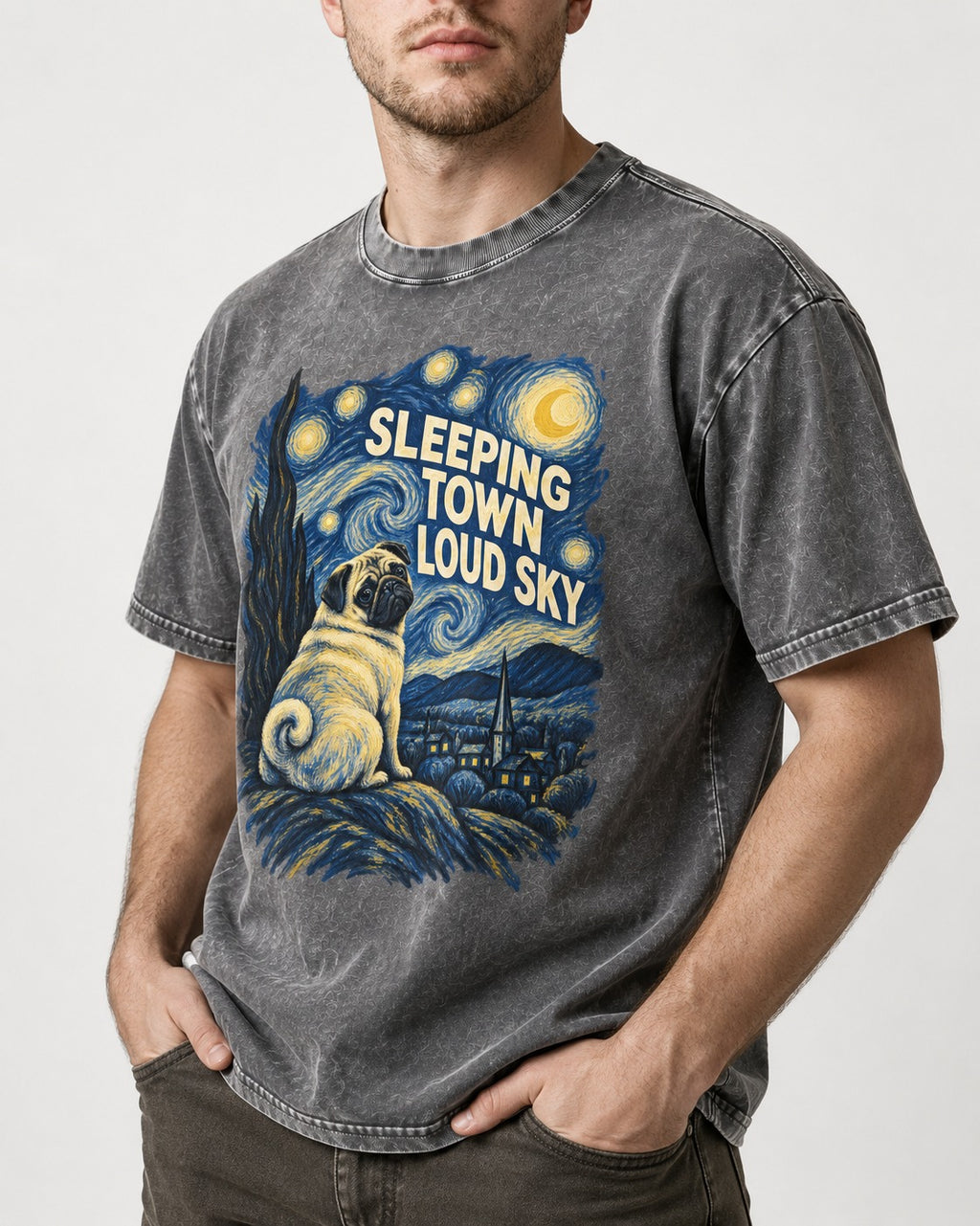 Pug Sleeping Town Loud Sky Starry Night Graphic Washed Tee in Gray, worn by a model, front view