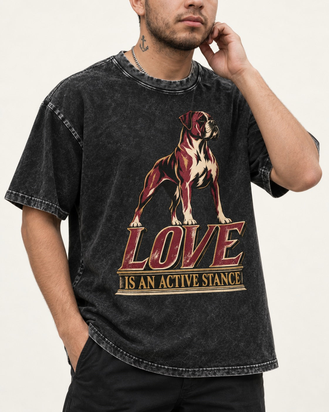 Love Is an Active Stance Boxer Pedestal Graphic Washed Tee in Black, worn by a model, front view